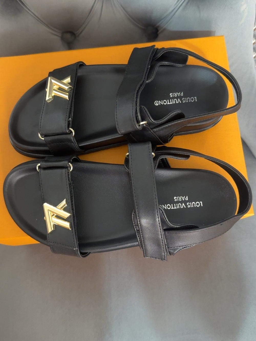 Louis Vuitton Black Leather Slingback Sandals with Gold LV Emblem